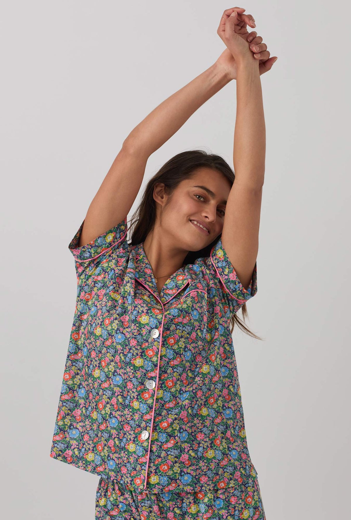 A lady wearing Short Sleeve Classic Woven Tana Lawn® Cropped PJ Set with clare rich print