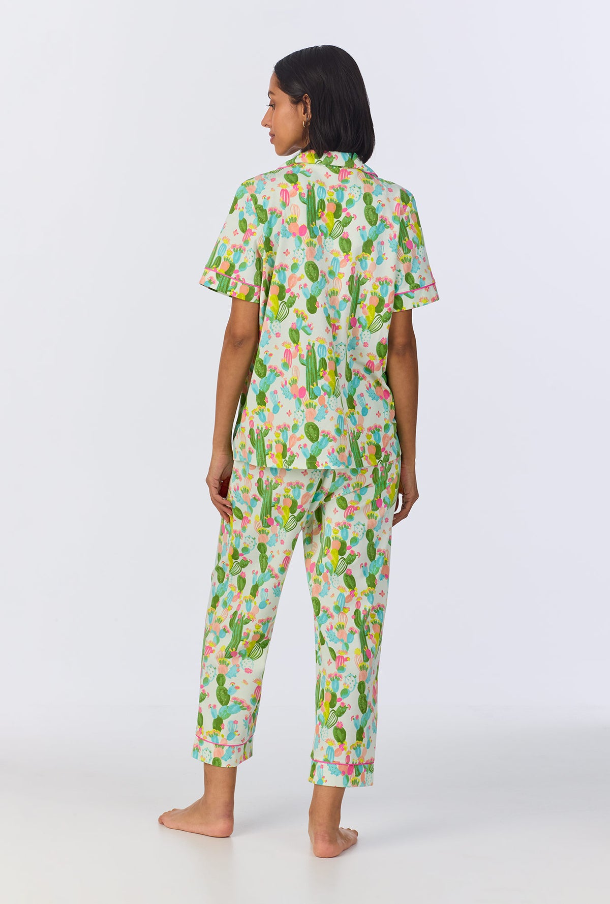 A lady wearing Cactus Garden Short Sleeve Classic Stretch Jersey Cropped PJ Set