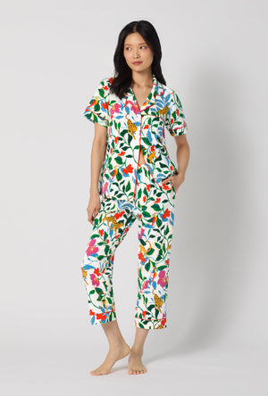 A Lady Wearing Jungle Serenade Short Sleeve Classic Stretch Jersey Cropped Pj Set facing front looking to the size