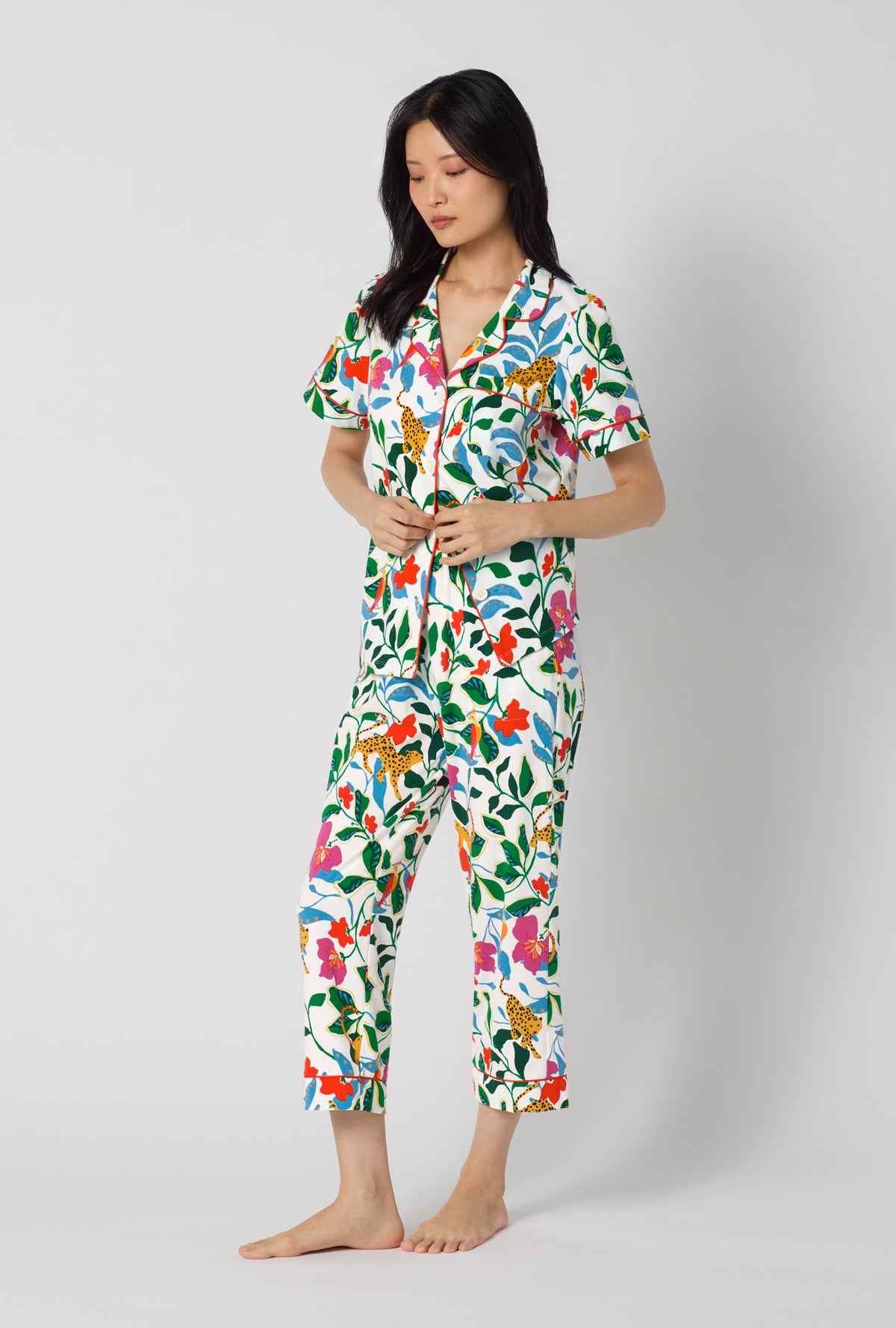 A Lady Wearing Jungle Serenade Short Sleeve Classic Stretch Jersey Cropped Pj Set posing in a side angle look