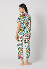 A Lady Wearing Jungle Serenade Short Sleeve Classic Stretch Jersey Cropped Pj Set showing the back view