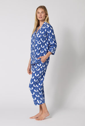 A lady wearing Owl Be Back 3/4 Sleeve Classic Stretch Jersey Cropped Pj Set side view