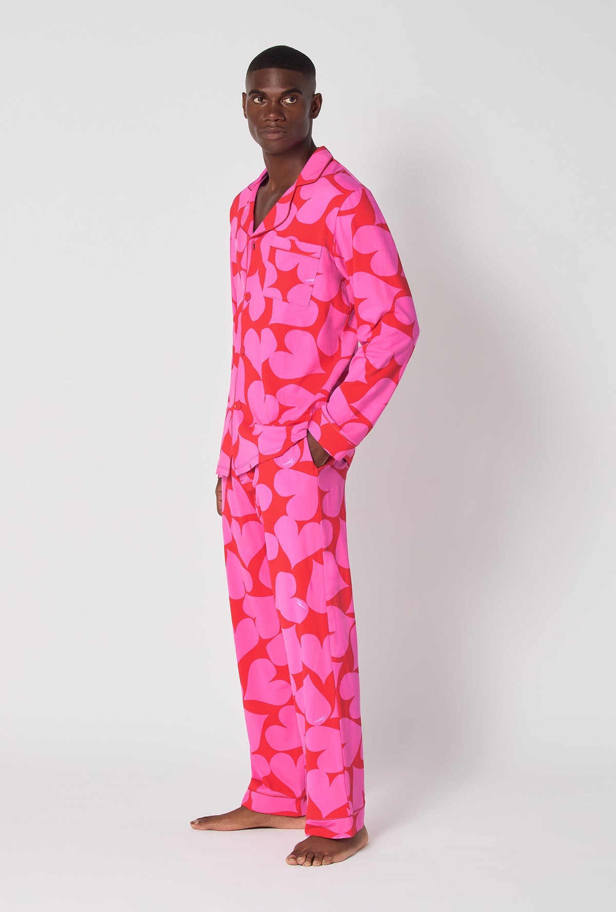 A man wearing BedHead x Mr. Turk Hearts Men's Long Sleeve Classic Stretch Jersey Pj Set