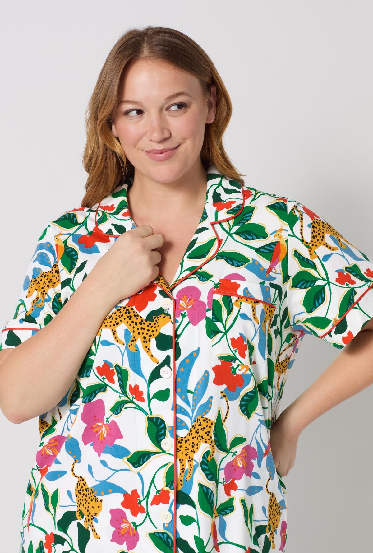 A Lady Wearing Plus Size Jungle Serenade Short Sleeve Classic Stretch Jersey Cropped Pj Set posing with a half zoomed close  up view