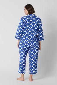 A lady wearing plus size Owl Be Back 3/4 Sleeve Classic Stretch Jersey Cropped Pj Set back view