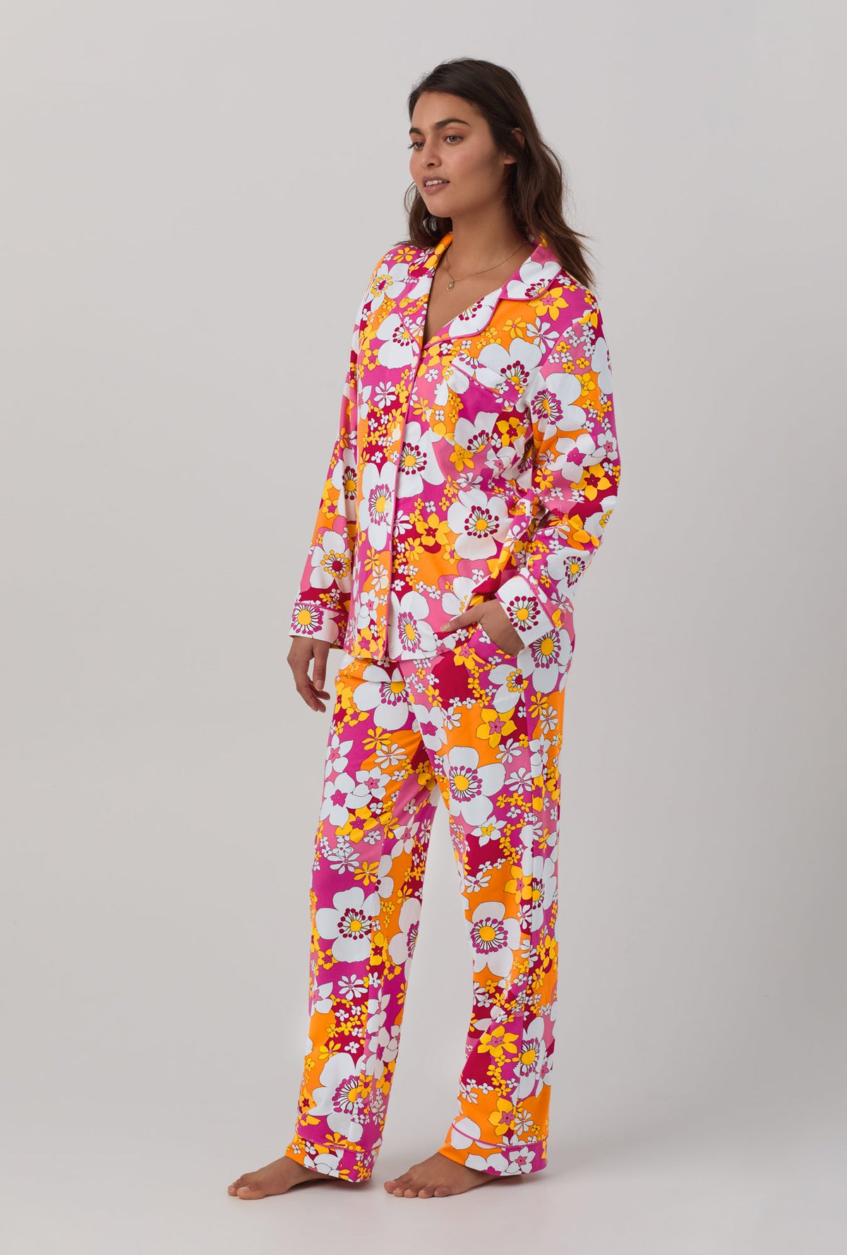 A lady wearing long sleeve classic stretch jersey pj set with bali pink floral print