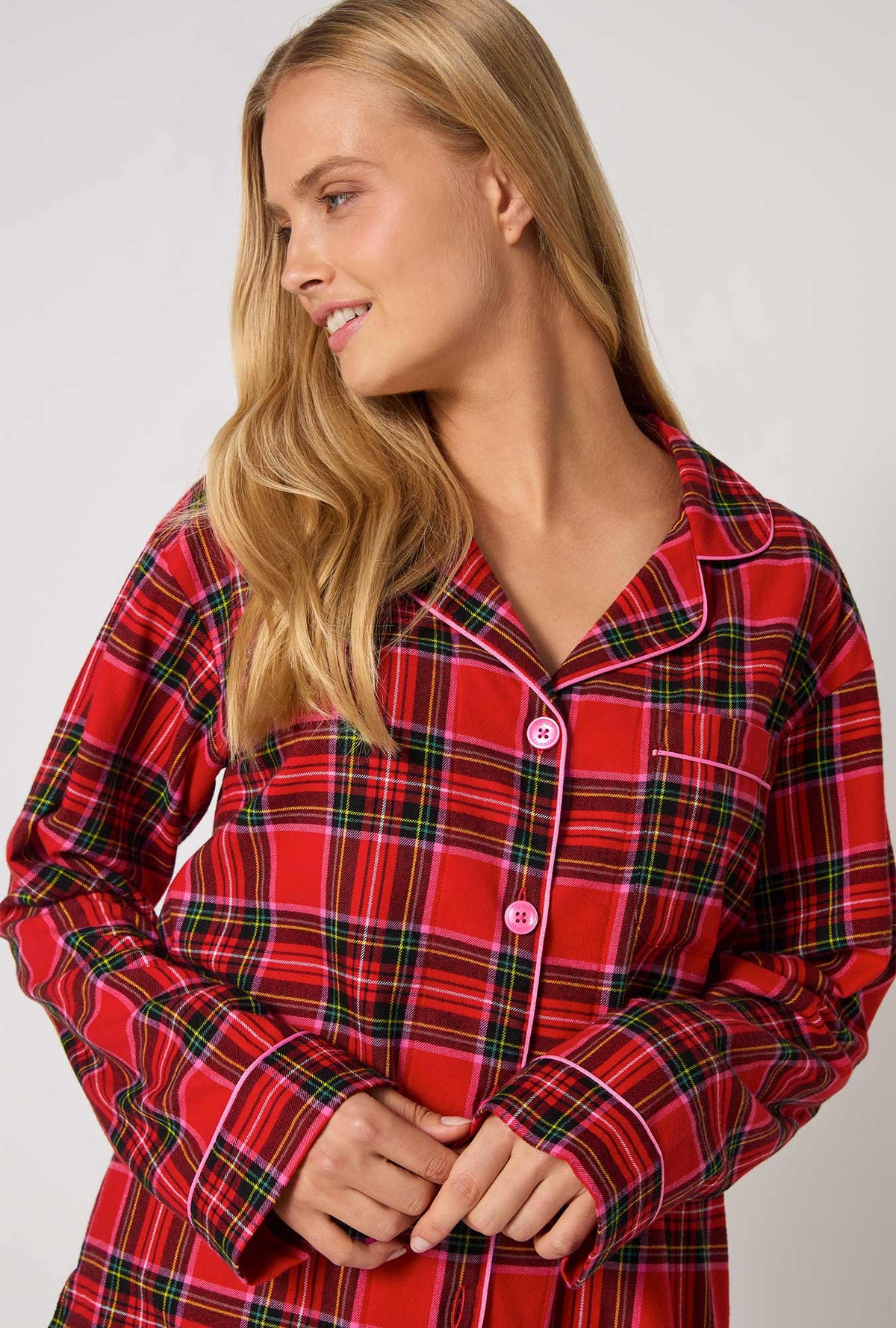 A lady wearing BedHead X Trina Turk Christmas Plaid Long Sleeve Classic Woven Portuguese Flannel PJ Set