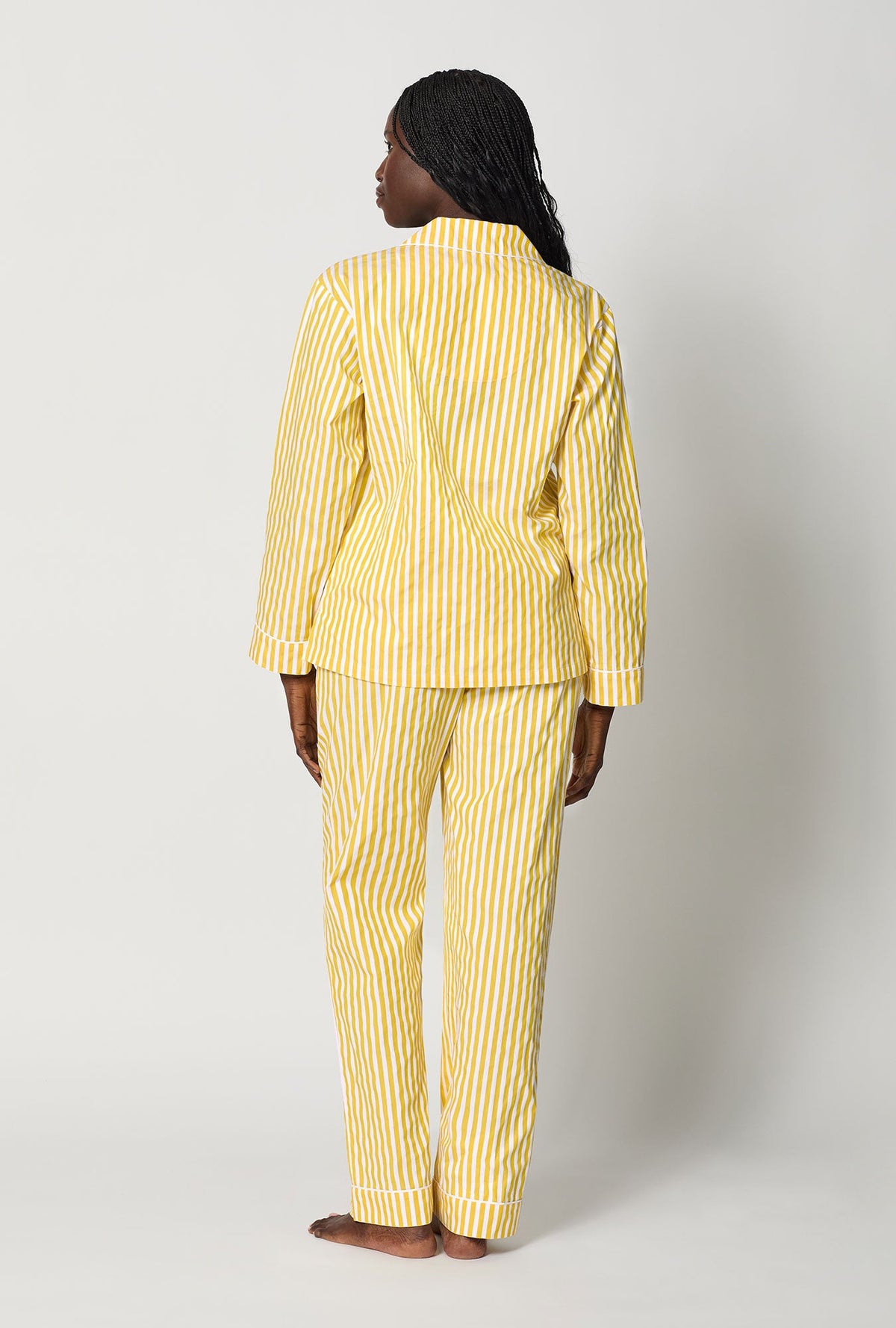 A lady wearing Yellow Long Sleeve Classic Woven Cotton Sateen Pj Set back view