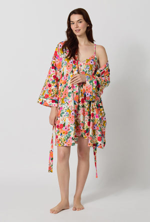 A lady wearing Rifle Paper Co. x BedHead PJs Garden Party Banded Collar Stretch Jersey Robe