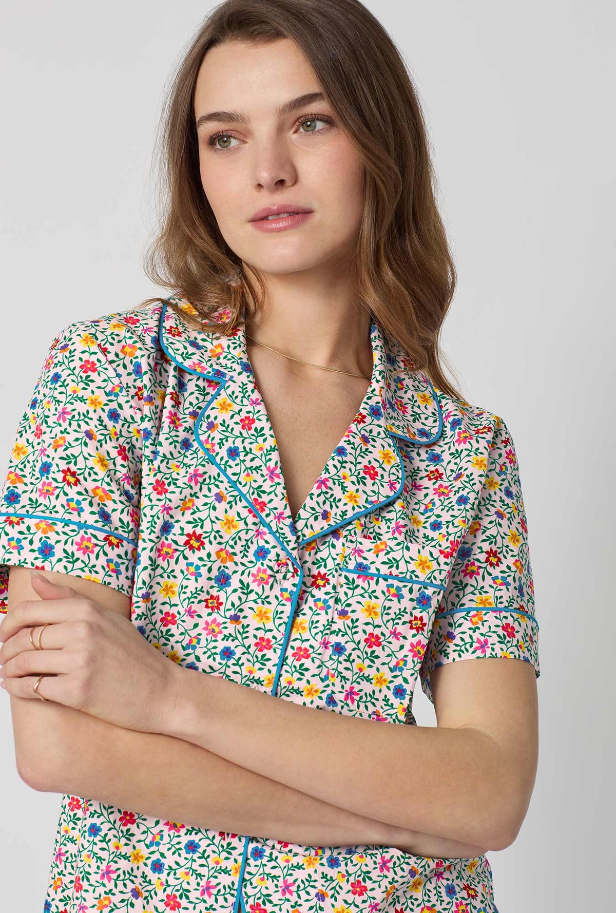 A closeup of A lady wearing Multi-Color and  Pink Short Sleeve Classic Woven Cotton Poplin Shorty Pj Set