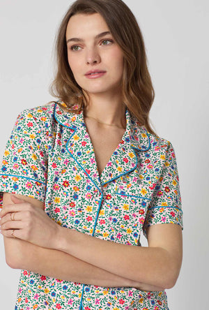 A closeup of A lady wearing Multi-Color and  Pink Short Sleeve Classic Woven Cotton Poplin Shorty Pj Set