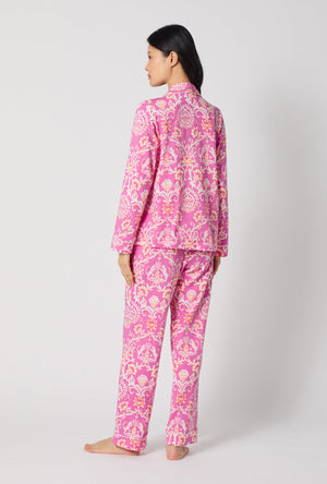 A Lady Wearing Luxe Leopard Long Sleeve Classic Stretch Jersey Pj Set turned back while looking to the side