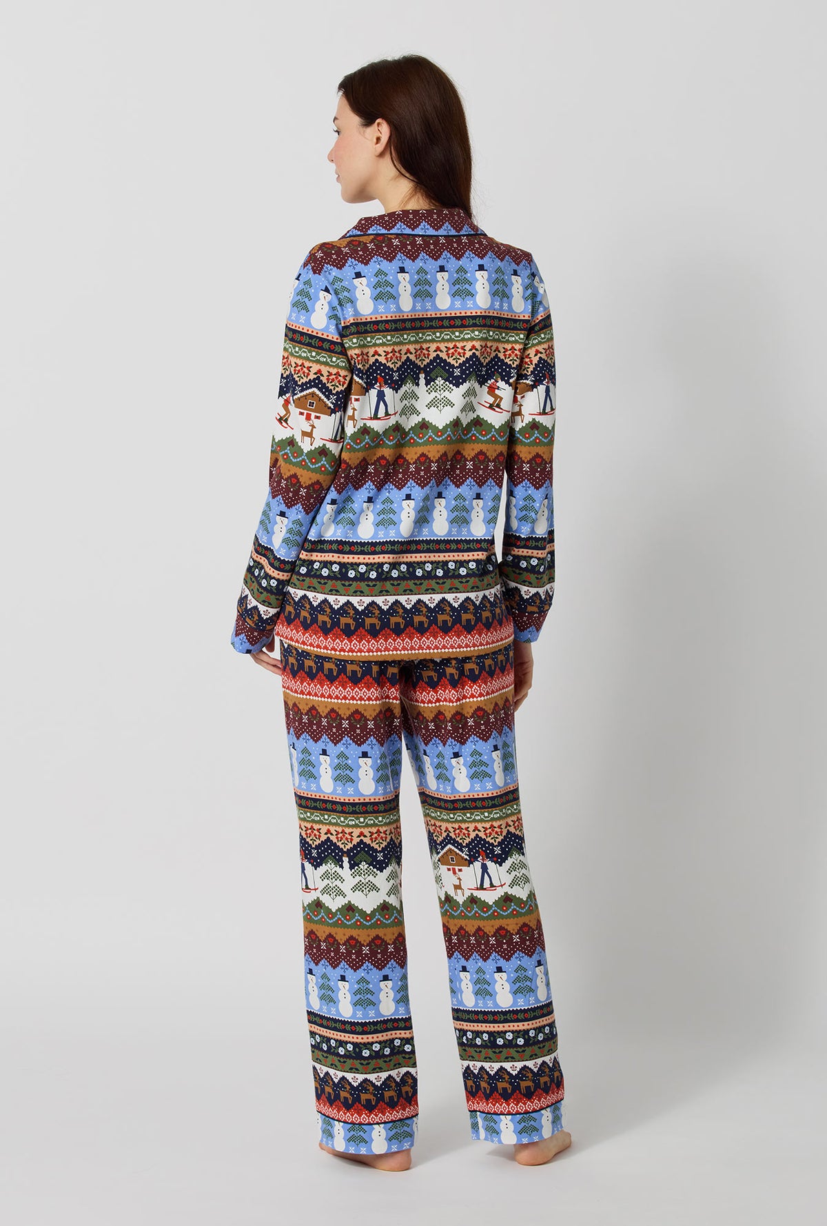 A lady wearing Rifle Paper Co. x BedHead PJs Ski Chalet Long Sleeve Classic Stretch Jersey Pj Set back view