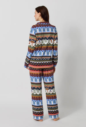 A lady wearing Rifle Paper Co. x BedHead PJs Ski Chalet Long Sleeve Classic Stretch Jersey Pj Set back view