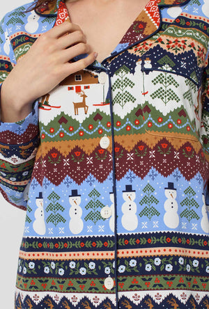 A lady wearing Rifle Paper Co. x BedHead PJs Ski Chalet Long Sleeve Classic Stretch Jersey Pj Set closer look