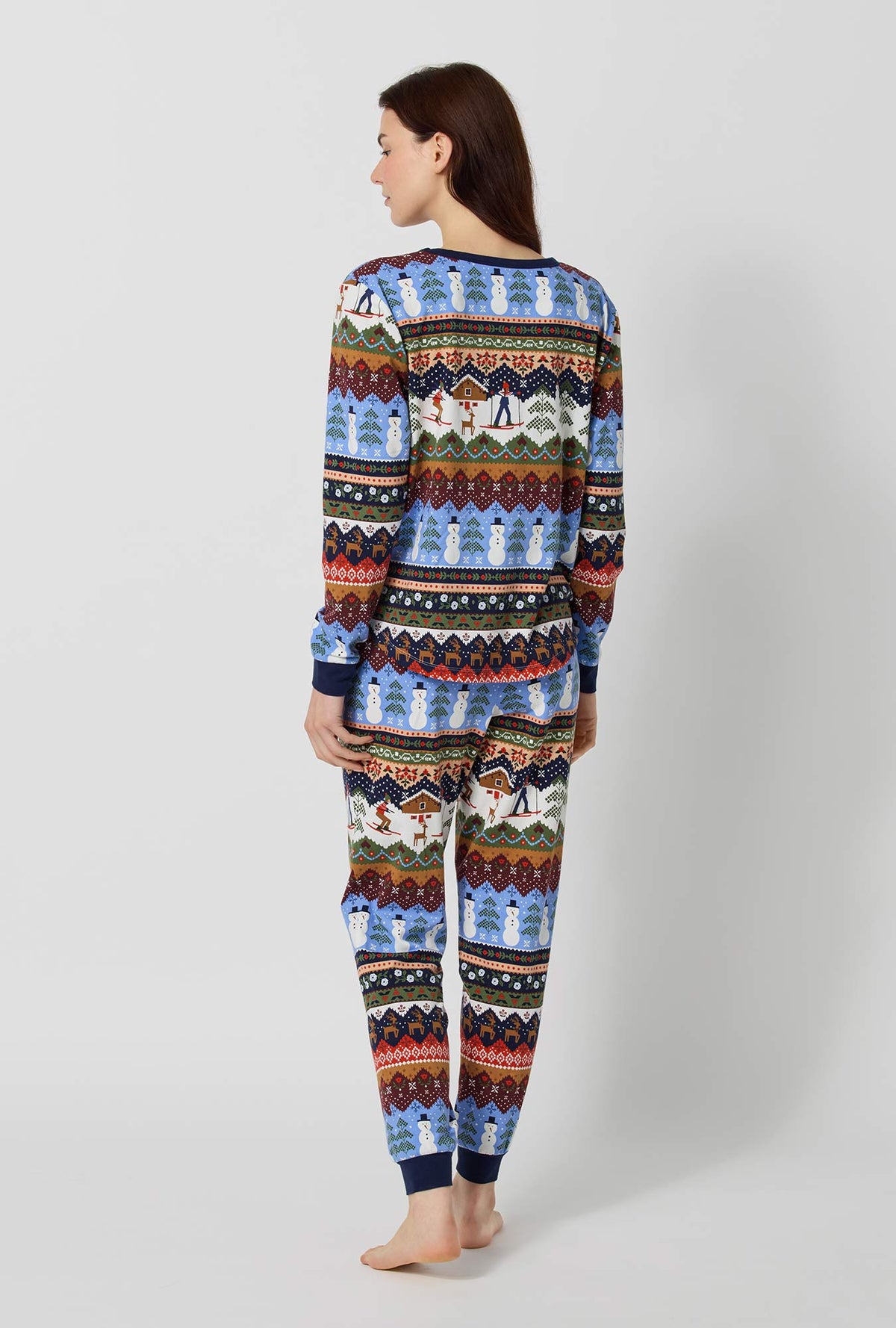 A lady wearing Rifle Paper Co. x BedHead PJs Ski Chalet Long Sleeve Pullover Crew And Jogger Stretch Jersey Pj Set back view