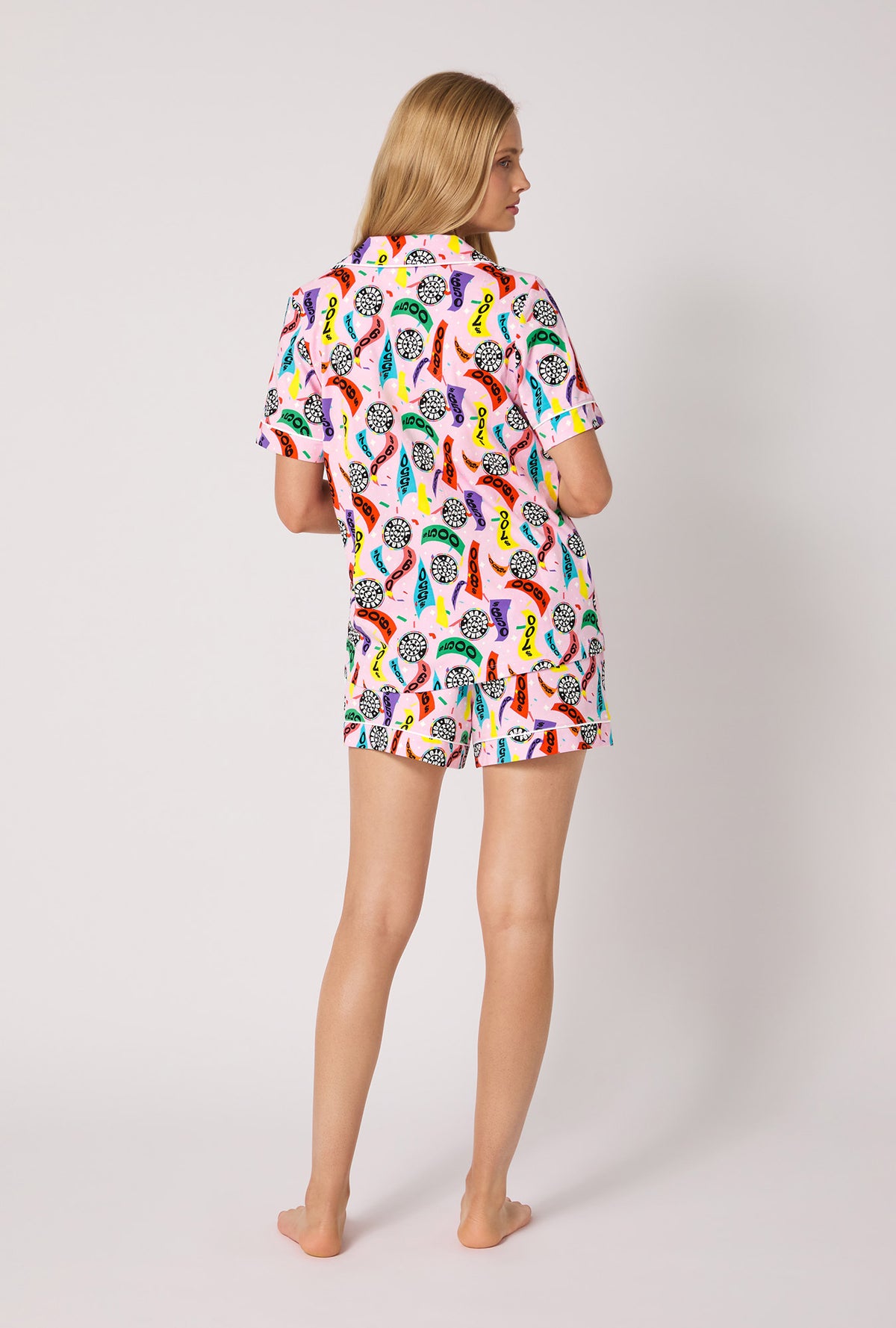 A lady wearing Spin To Win Short Sleeve Classic Shorty Stretch Jersey Pj Set