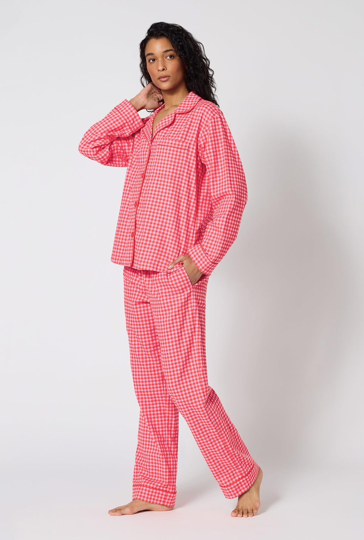 A lady wearing Jane Gingham Long Sleeve Classic Woven Portuguese Flannel Pj Set walking