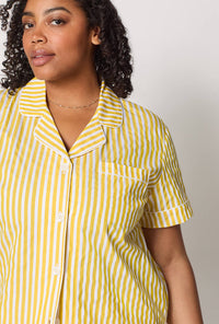 A closeup of A lady wearing plus size Yellow Short Sleeve Classic Shorty Woven Cotton Sateen Pj Set