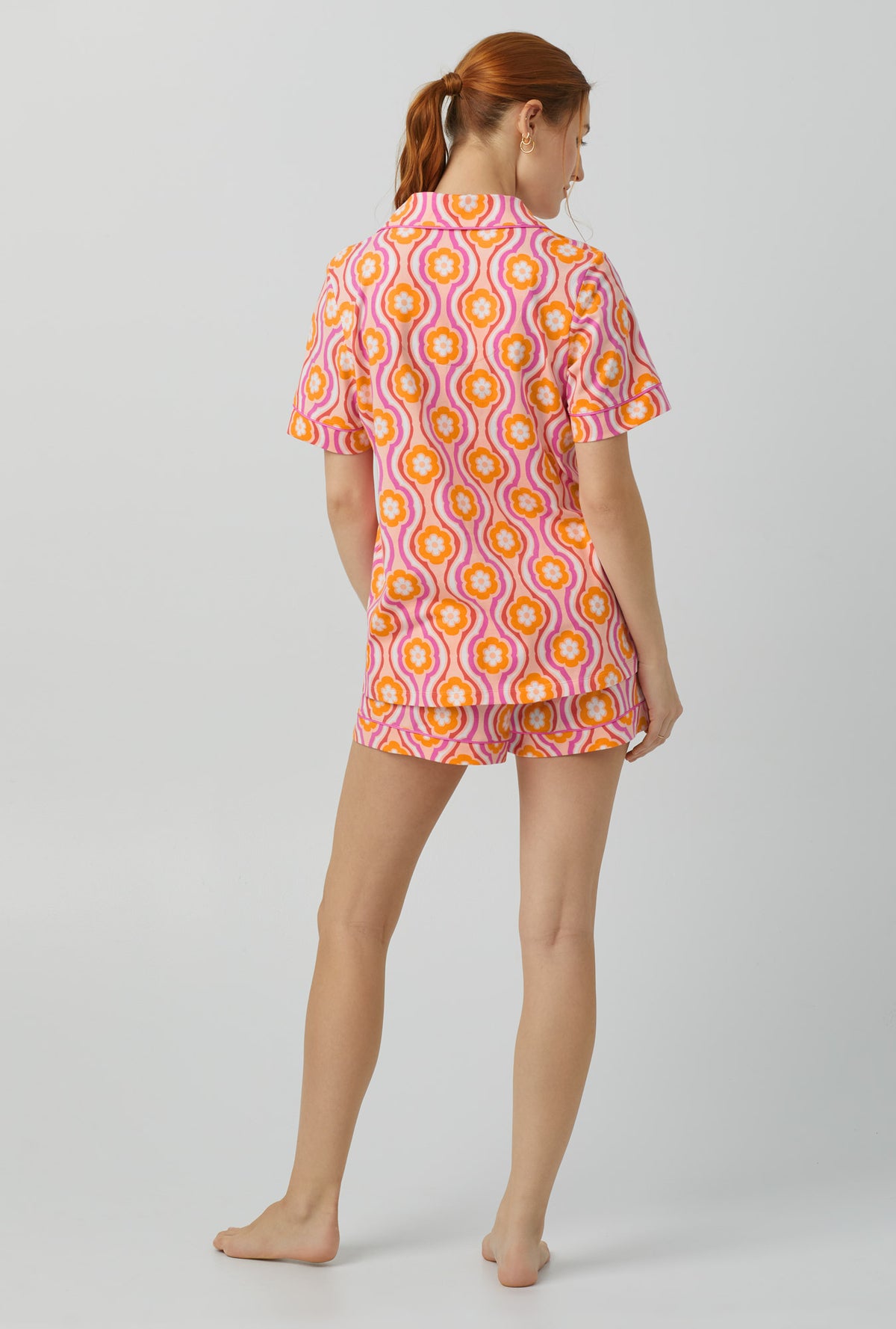 A lady wearing Short Sleeve Classic Shorty Stretch Jersey PJ Set with flower swirl print