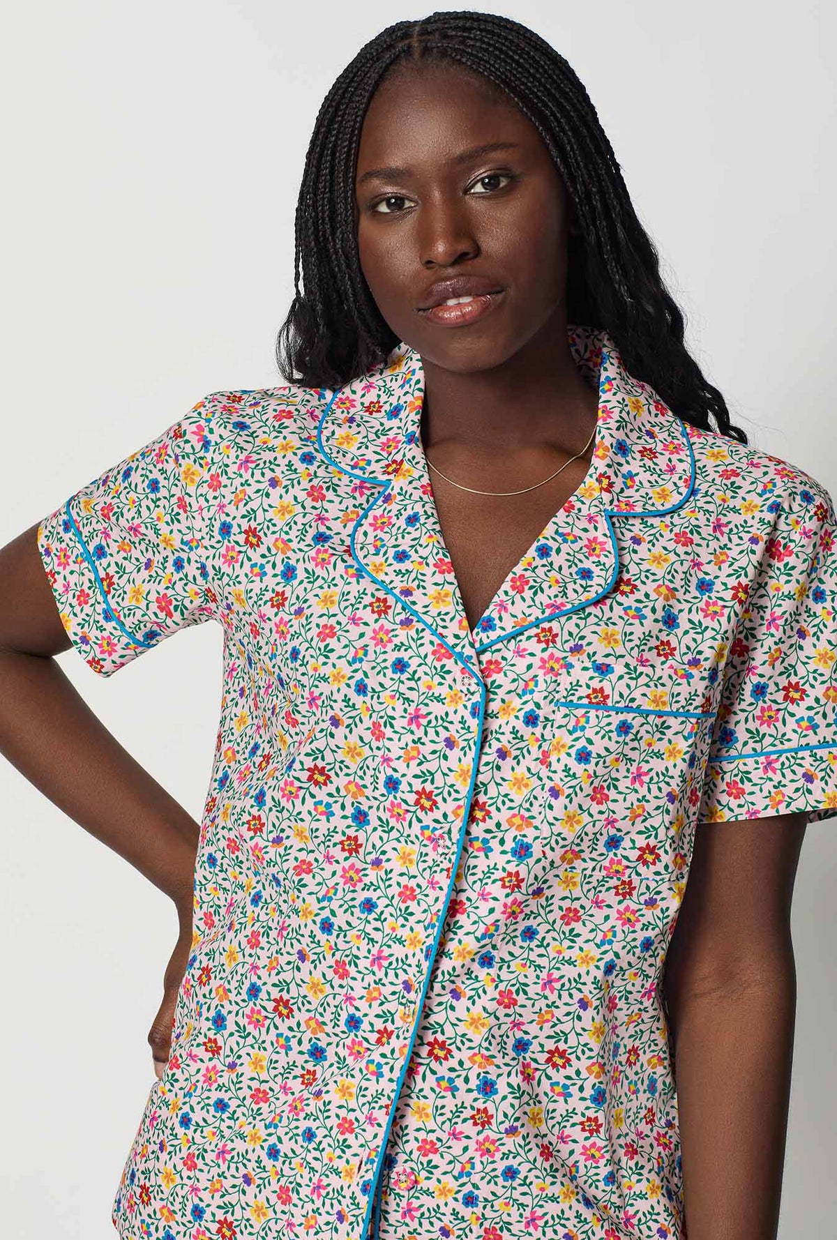 A closeup of A lady wearing Multi-Color and  Pink Short Sleeve Classic Woven Cotton Poplin Cropped Pj Set