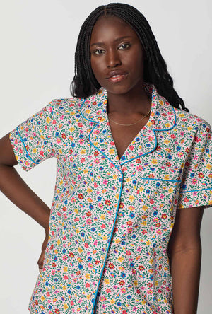 A closeup of A lady wearing Multi-Color and  Pink Short Sleeve Classic Woven Cotton Poplin Cropped Pj Set