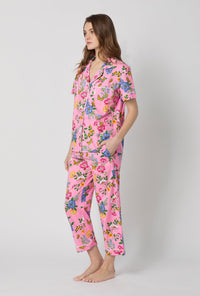 A lady wearing Pink Short Sleeve Classic Woven Cotton Poplin Cropped Pj Set side view