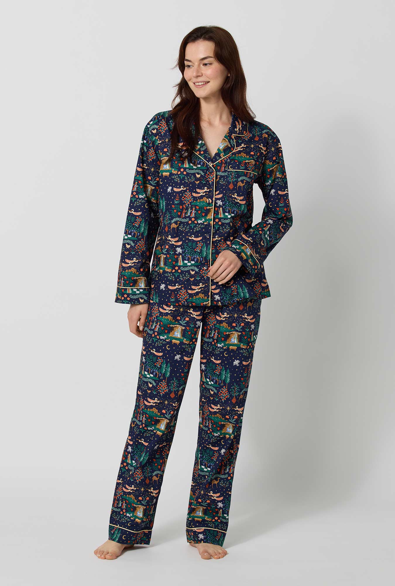 A lady wearing Rifle Paper Co. x BedHead PJs Nativity Long Sleeve Classic Woven Cotton Poplin Pj Set