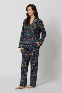 A lady wearing Rifle Paper Co. x BedHead PJs Nativity Long Sleeve Classic Woven Cotton Poplin Pj Set looking side