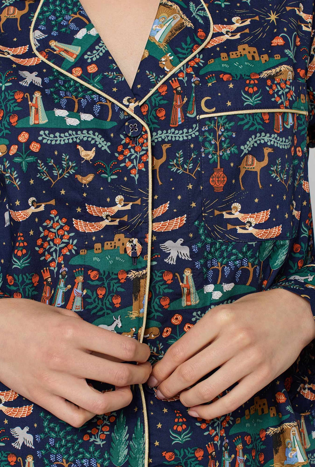 A lady wearing Rifle Paper Co. x BedHead PJs Nativity Long Sleeve Classic Woven Cotton Poplin Pj Set closer look
