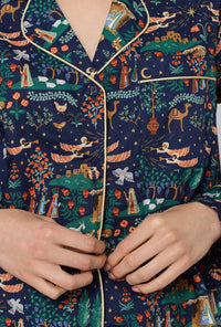 A lady wearing Rifle Paper Co. x BedHead PJs Nativity Long Sleeve Classic Woven Cotton Poplin Pj Set closer look