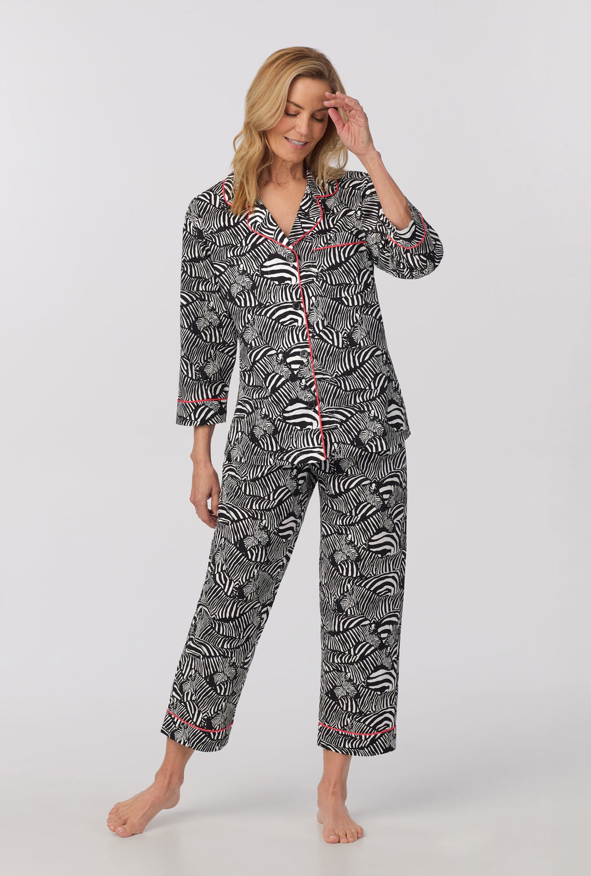 A lady wearing quarter Sleeve Classic Woven Cotton Cropped PJ Set with  Zebra Safari print