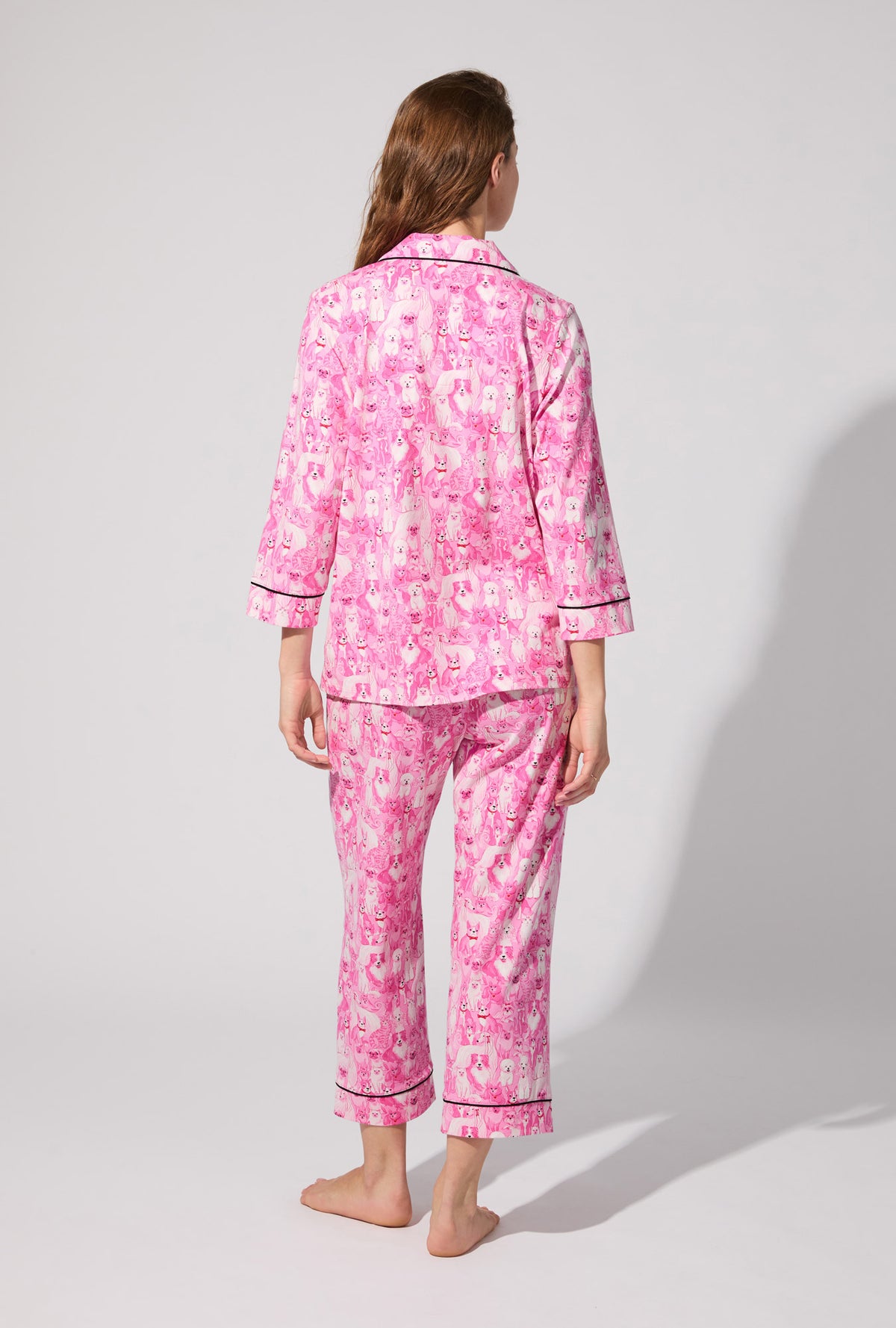 A lady wearing Paw-fectly Pink 3/4 Sleeve Classic Stretch Jersey Cropped PJ Set