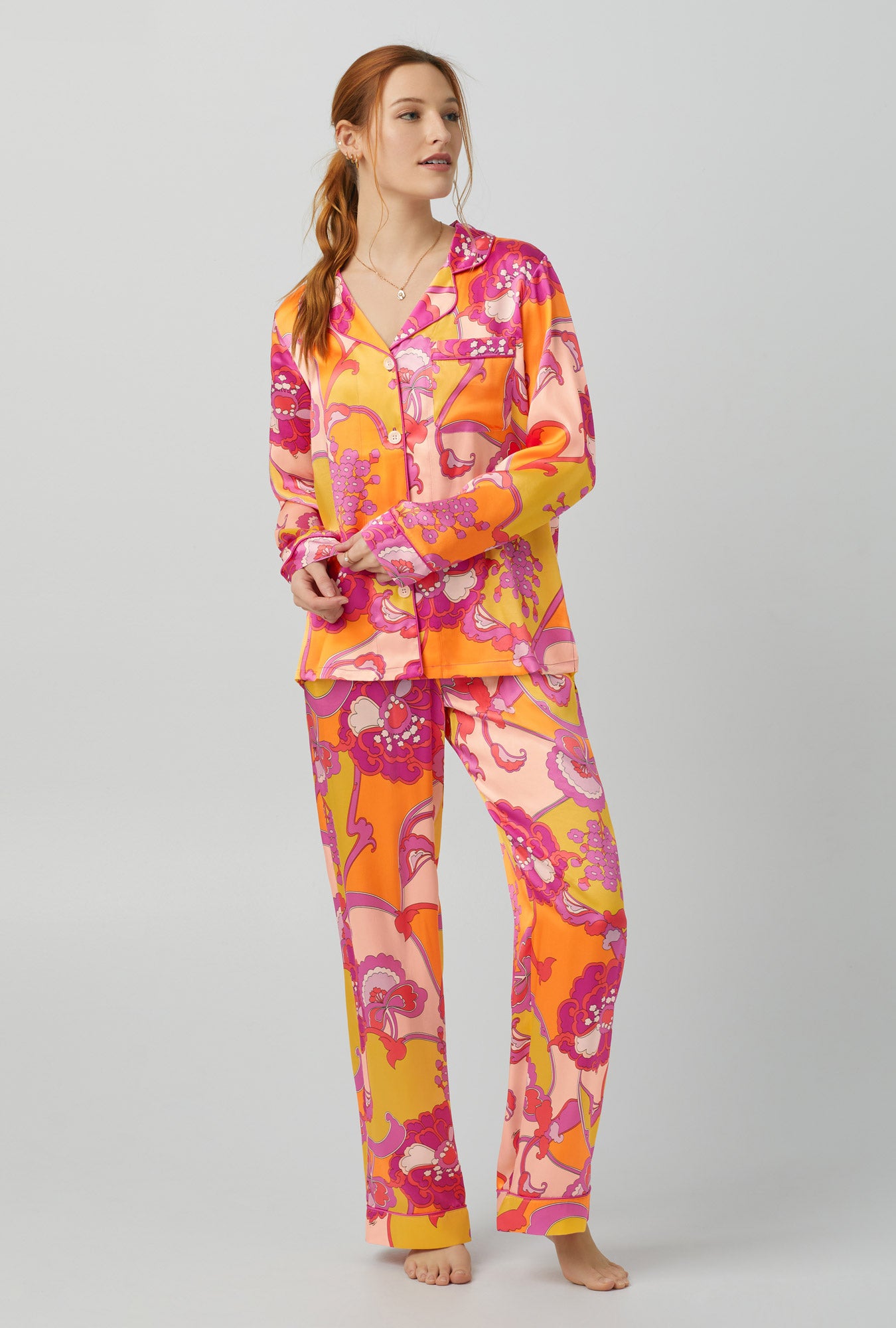A lady wearing Long Sleeve Classic Washable Silk PJ Set with apache bloom print