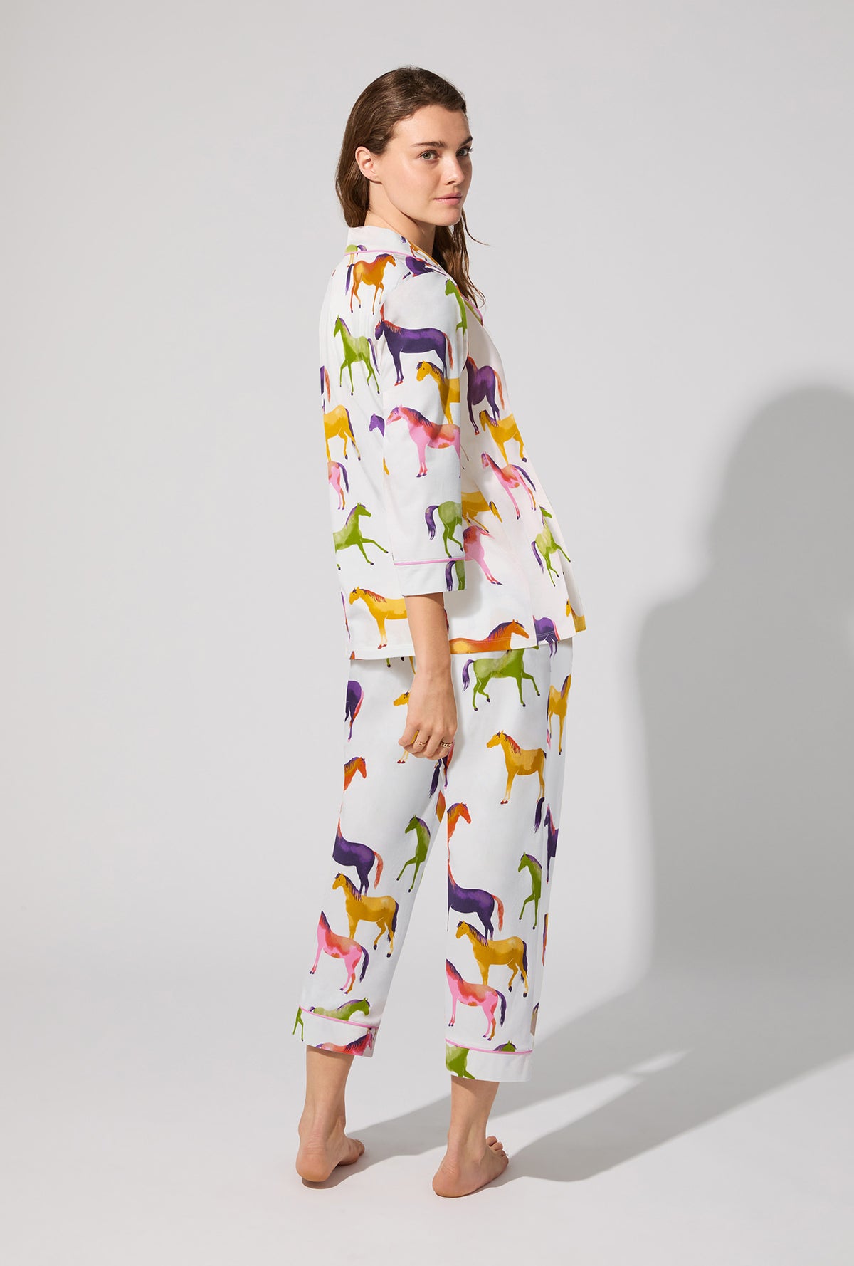 A lady wearing Equestrian Parade 3/4 Sleeve Classic Stretch Jersey Cropped PJ Set