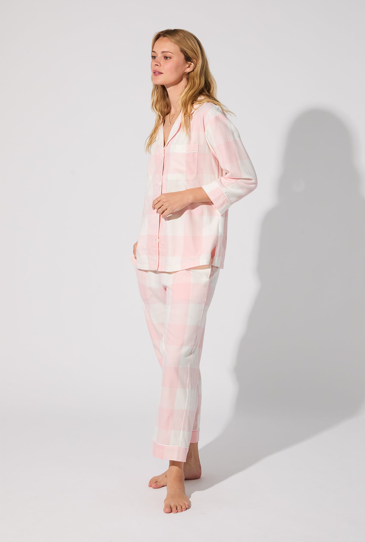 A lady wearing Checking In 3/4 Sleeve Classic Woven Portuguese Flannel Cropped PJ Set