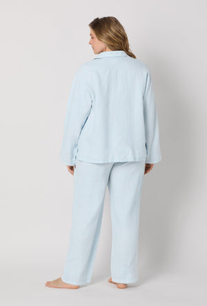 A lady wearing plus size Baby's Breath Blue Long Sleeve Classic Woven Linen Pj Set back view