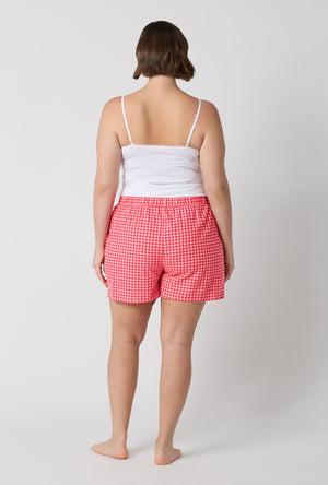 A lady wearing plus size Jane Gingham Woven Portuguese Flannel Boxer Short back view