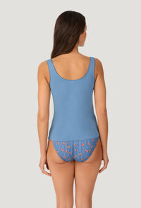 A lady wearing Country Blue Stretch Jersey Tank back view