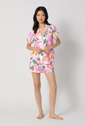 A Lady Wearing Tropical Daydream Short Sleeve Classic Shorty Stretch Jersey Pj Set