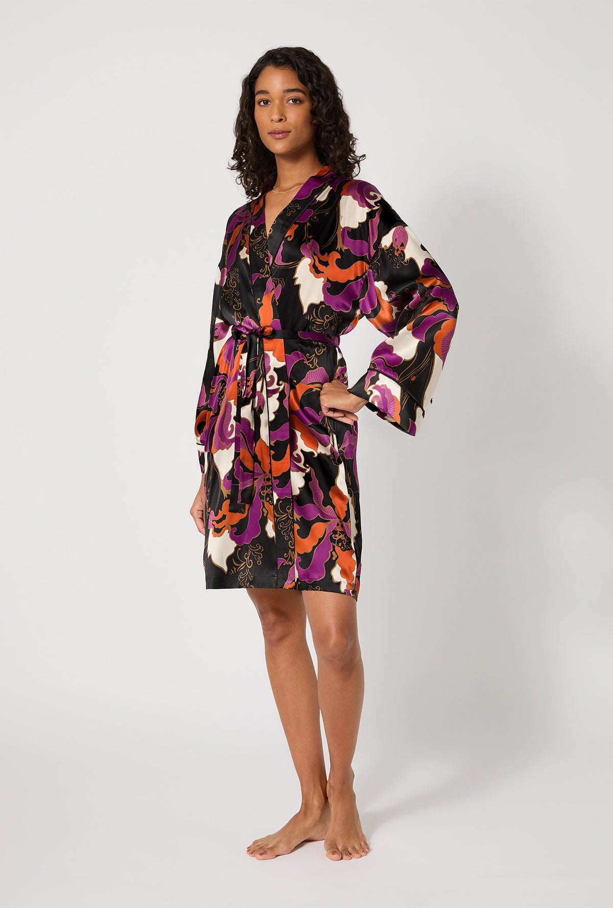 A lady wearing BedHead X Trina Turk Fall Floral Banded Collar Washable Silk Robe