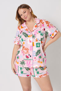 A Lady Wearing Plus Size Tropical Daydream Short Sleeve Classic Shorty Stretch Jersey Pj Set facing front in a half close up shot