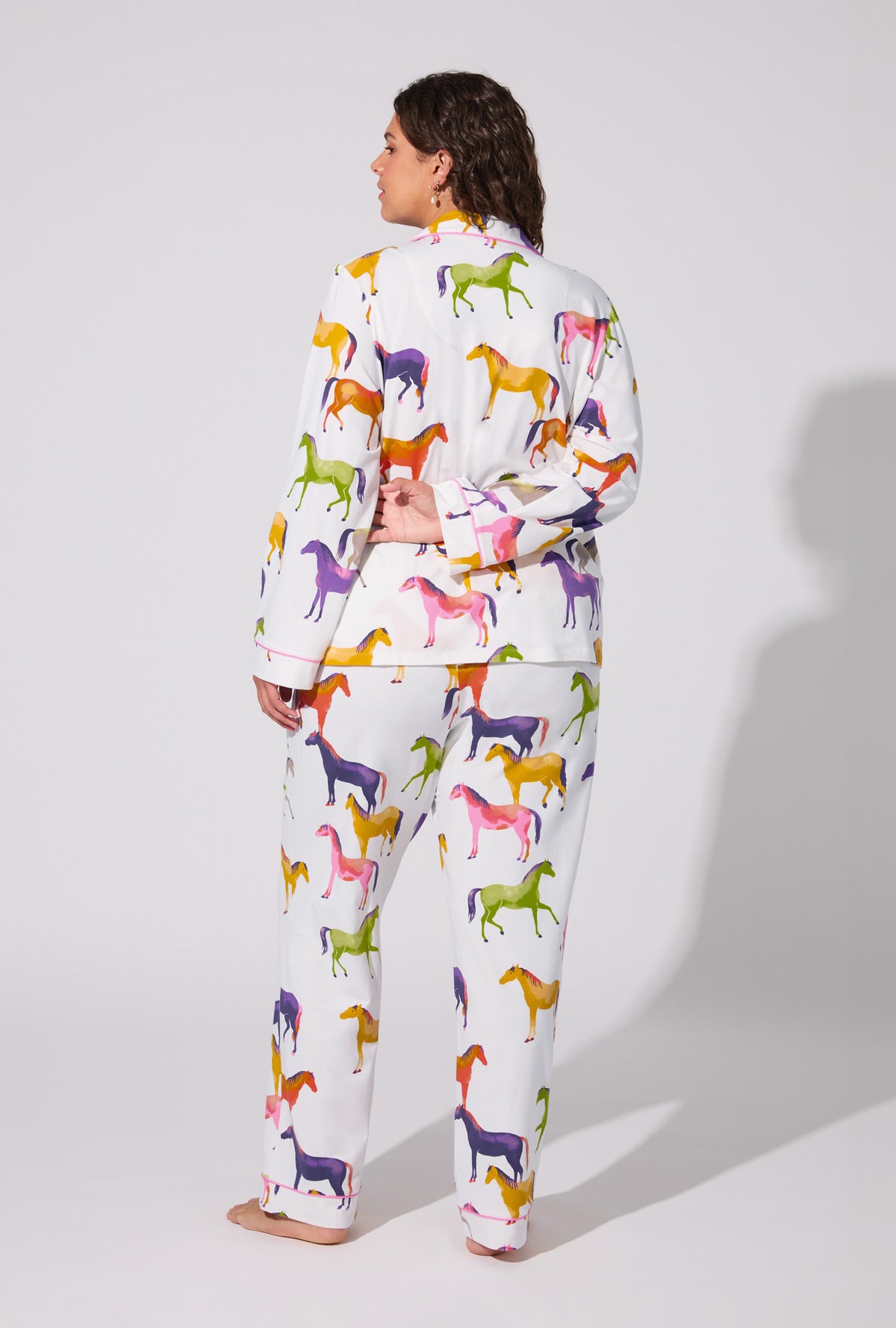 A lady wearing Equestrian Parade Long Sleeve Classic Stretch Jersey PJ Set