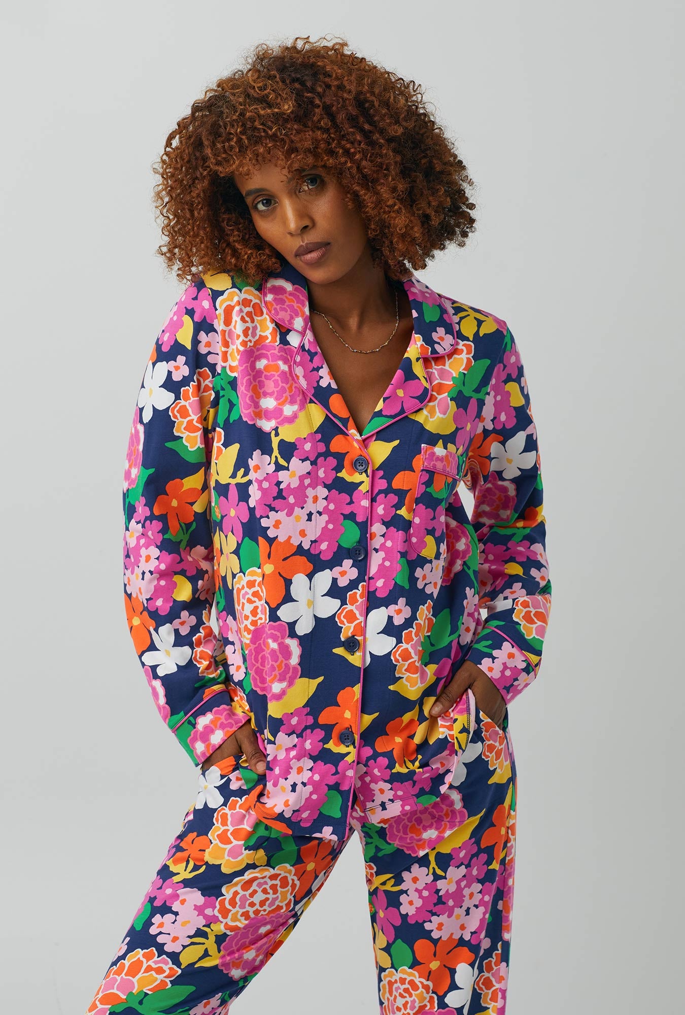 A lady wearing Long Sleeve Classic Stretch Jersey PJ Set with greenhouse floral print