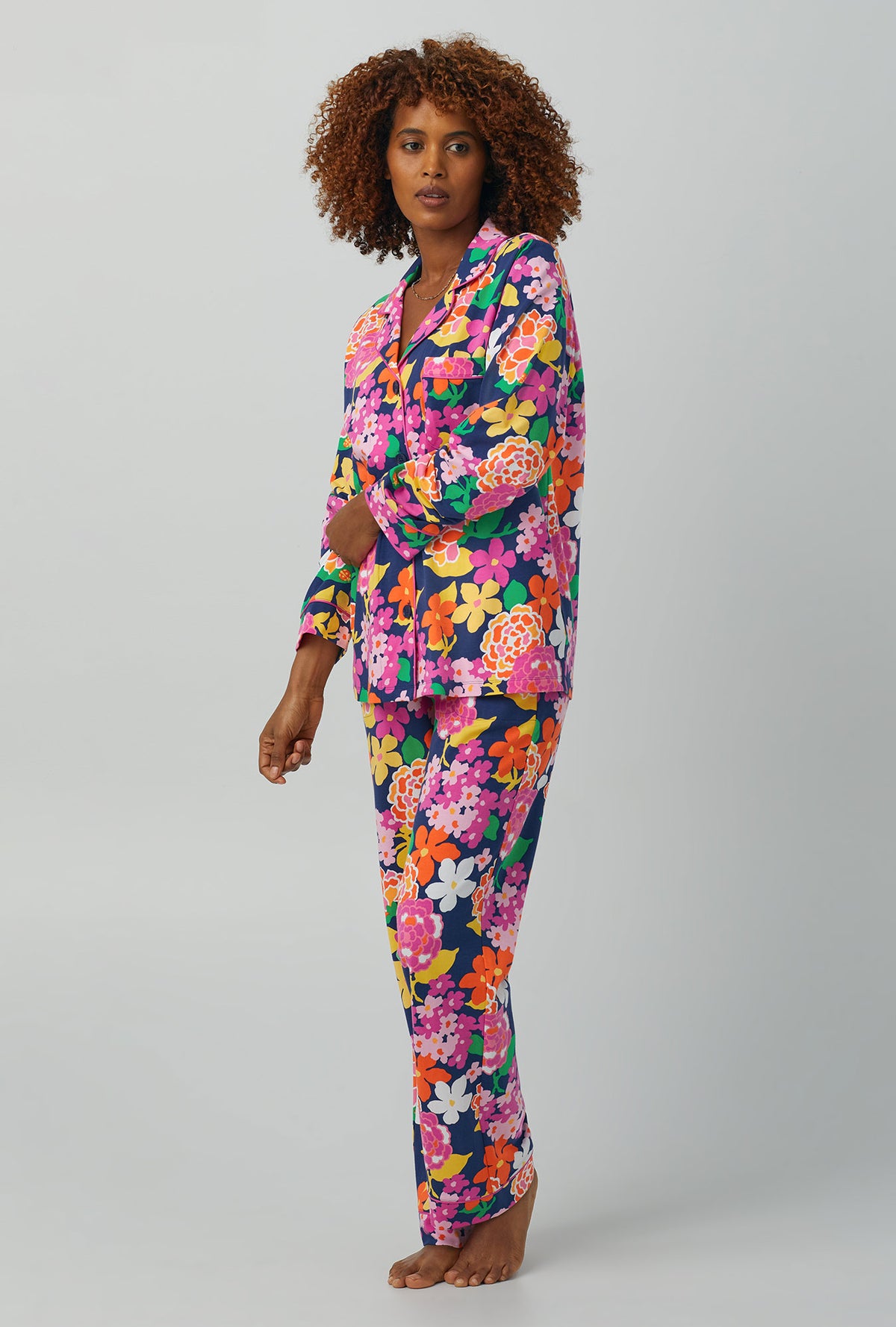 A lady wearing Long Sleeve Classic Stretch Jersey PJ Set with greenhouse floral print