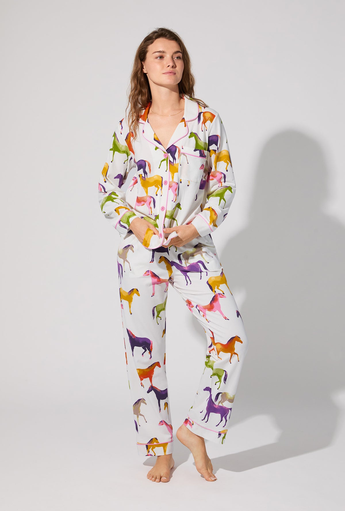 A lady wearing Equestrian Parade Long Sleeve Classic Stretch Jersey PJ Set