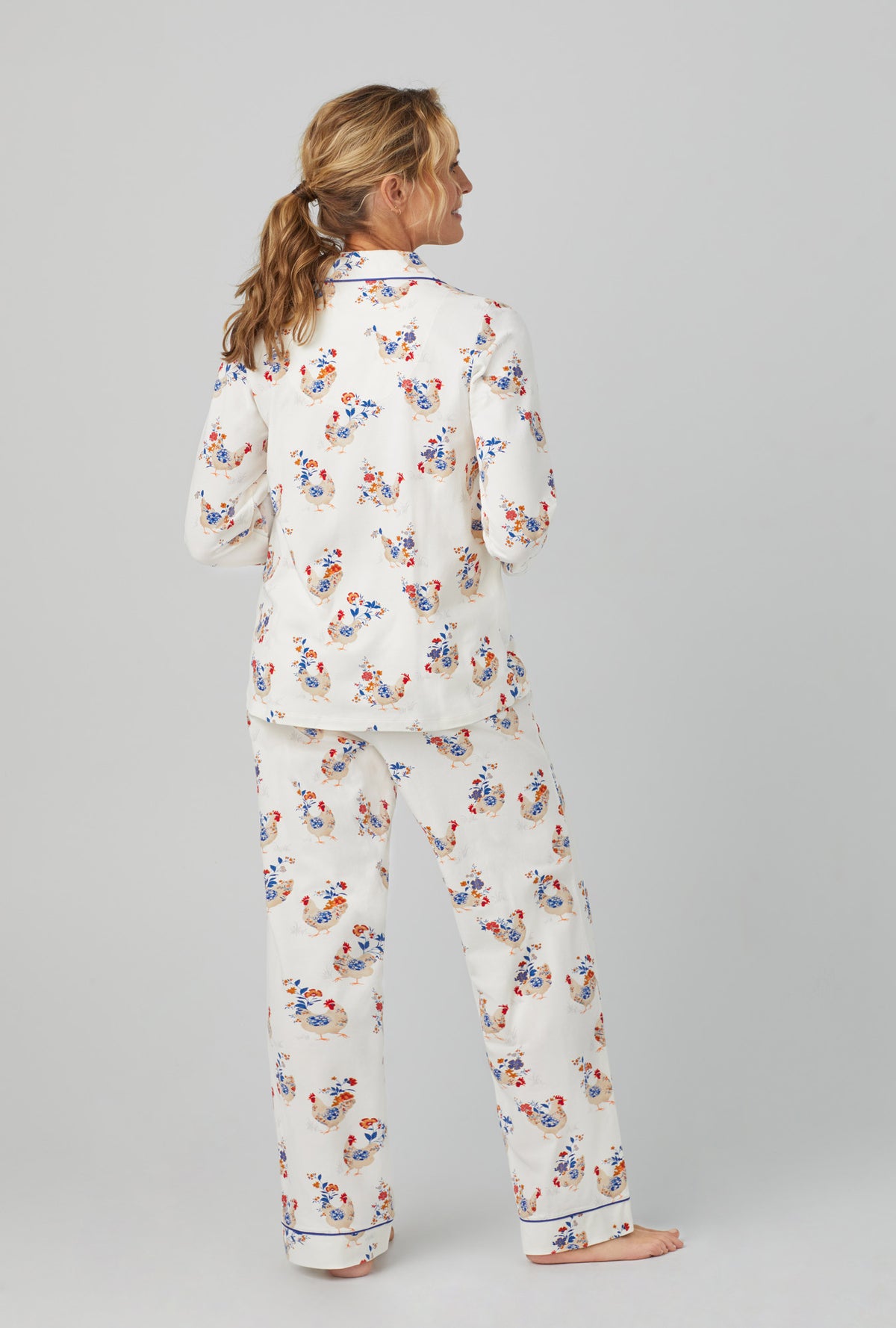 A lady wearing Long Sleeve Classic Stretch Jersey PJ Set with Hen House  print.