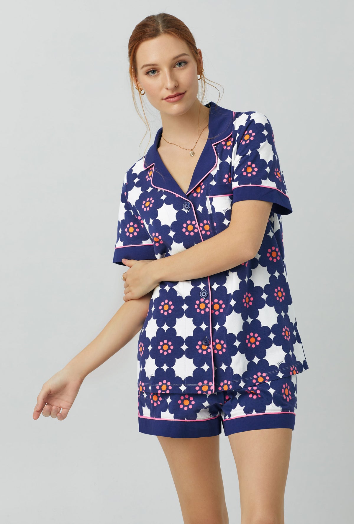 A lady wearing blue Short Sleeve Classic Shorty Stretch Jersey PJ Set with floral tile print