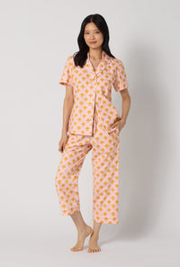 A Lady Wearing Deco Sunset Short Sleeve Classic Woven Cotton Poplin Cropped Pj Set facing front view