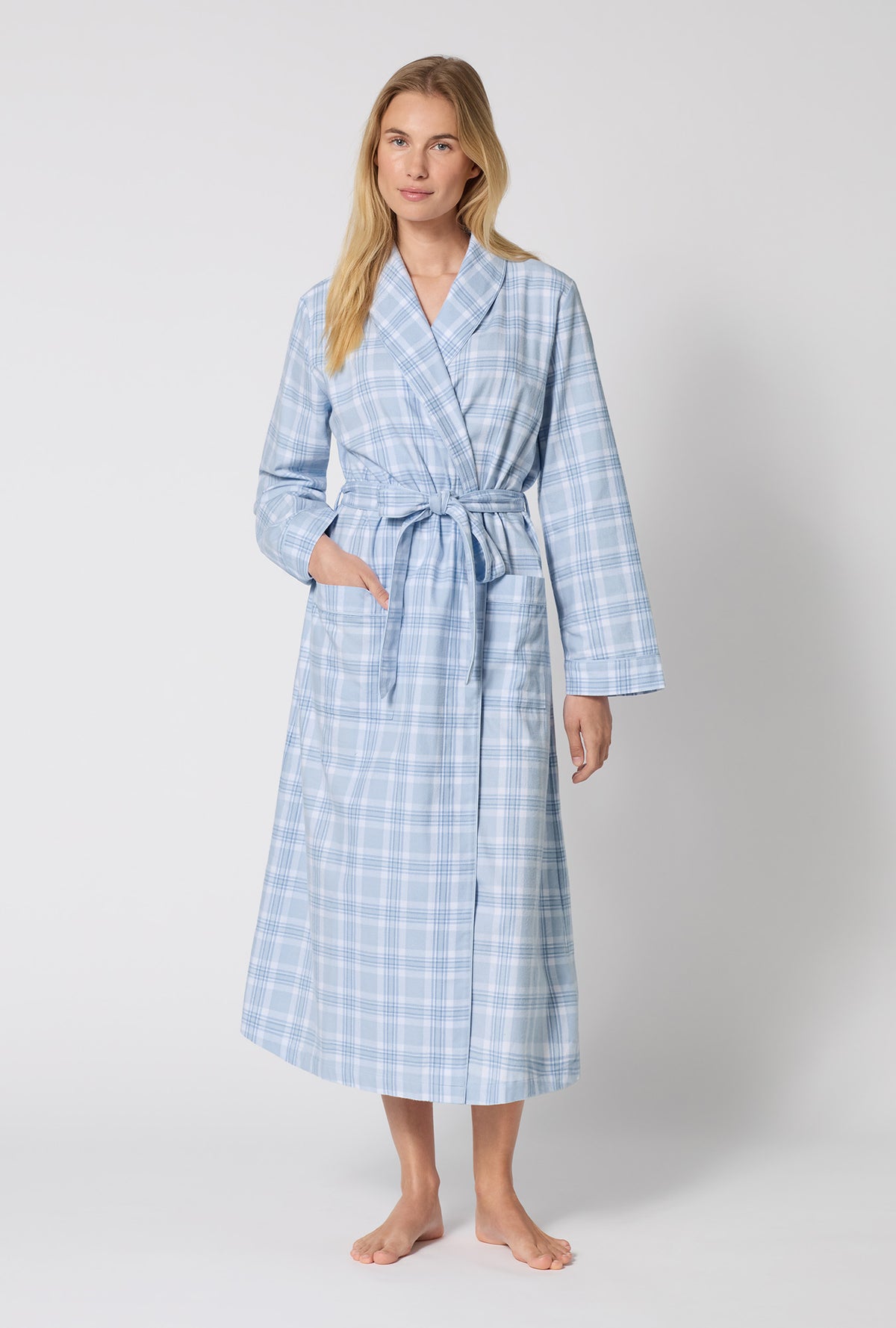 A lady wearing Meadow Haze Plaid Unisex Classic Woven Portuguese Flannel Robe De Chambre